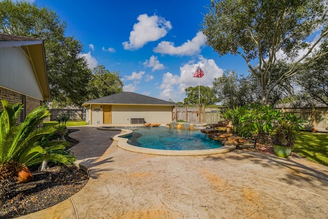 view of swimming pool with a patio