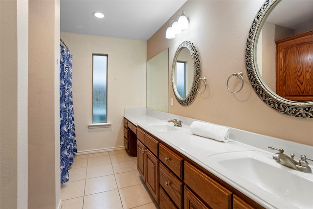 bathroom featuring tile patterned floors and vanity