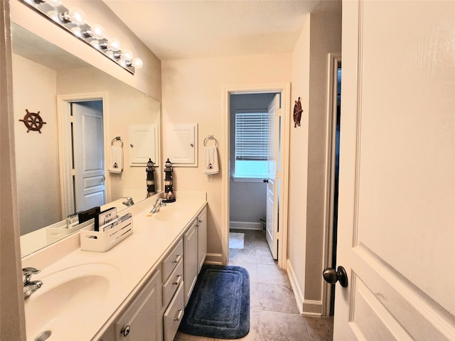 bathroom featuring vanity and tile patterned floors