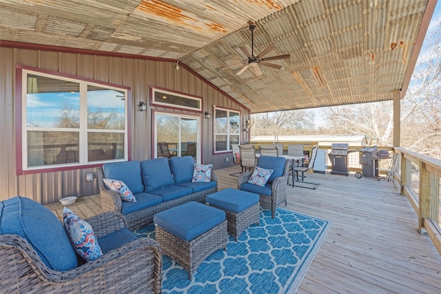 wooden deck featuring ceiling fan and an outdoor hangout area