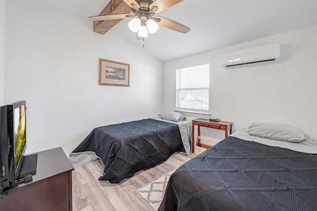 bedroom featuring a wall unit AC, vaulted ceiling with beams, ceiling fan, and light hardwood / wood-style flooring