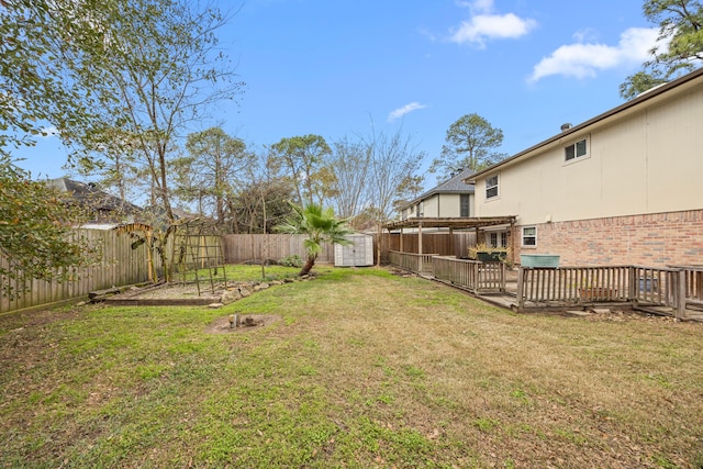 view of yard featuring a pergola and a storage shed