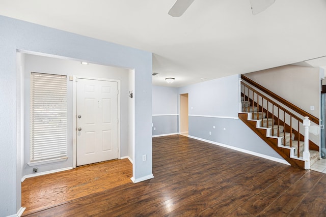 entryway featuring ceiling fan and dark hardwood / wood-style flooring