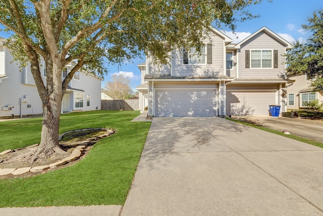 view of front of home featuring a garage and a front yard