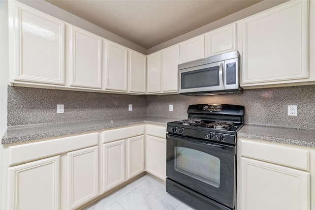 kitchen featuring backsplash, white cabinetry, light tile patterned floors, and black gas range oven