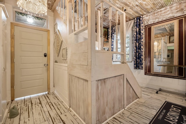 entryway featuring a notable chandelier