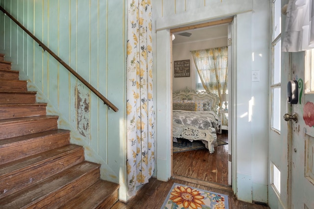 staircase featuring hardwood / wood-style floors