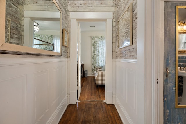 corridor with dark wood-type flooring