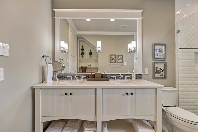 bathroom with decorative backsplash, toilet, and vanity