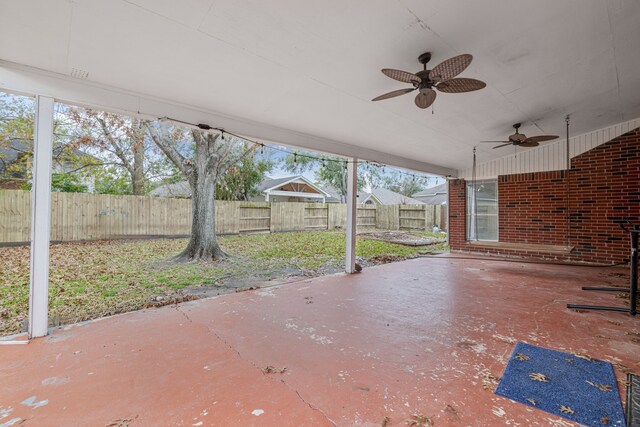 view of patio featuring ceiling fan