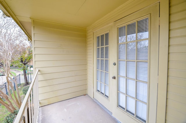 balcony featuring french doors