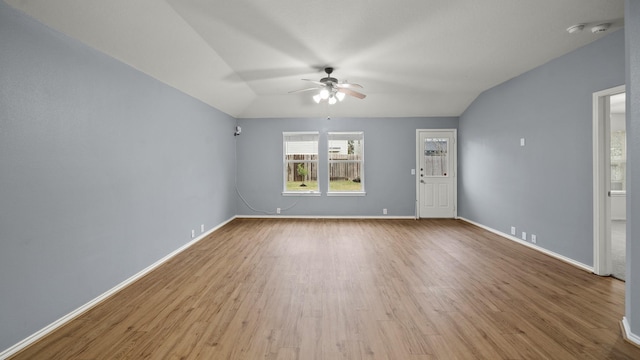 unfurnished room with light hardwood / wood-style flooring, ceiling fan, and lofted ceiling