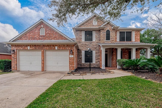 view of front property featuring a garage and a front yard