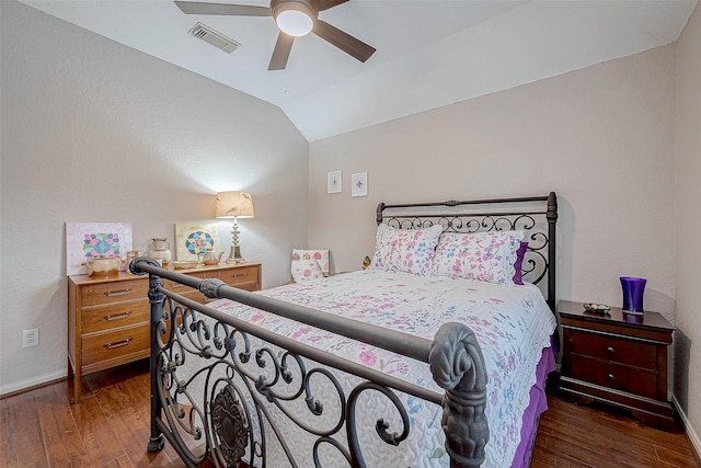 bedroom featuring dark wood-type flooring, ceiling fan, and lofted ceiling