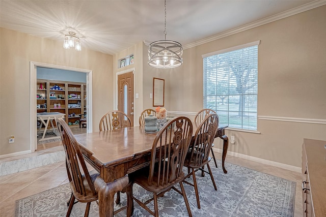 dining area with crown molding, a chandelier, and tile patterned flooring