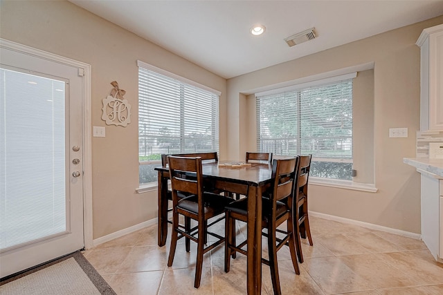 dining room featuring light tile patterned floors