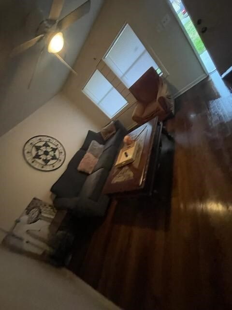 8130 Rockford Dr, Houston, TX 77033 - living room featuring ceiling fan and wood finished floors