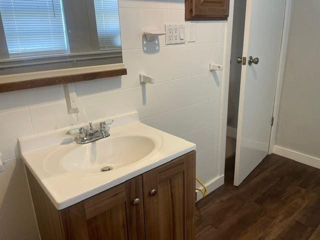 bathroom featuring hardwood / wood-style floors and vanity