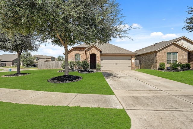 ranch-style home with a garage and a front yard