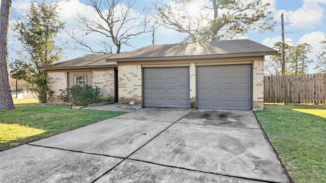 garage with a yard