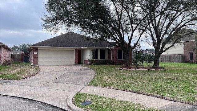 single story home with a garage and a front yard