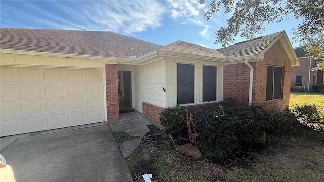 single story home featuring a garage