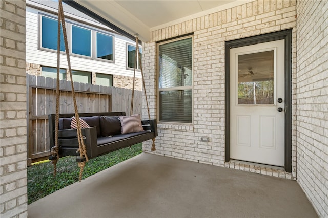 entrance to property featuring covered porch