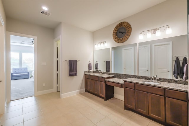 bathroom featuring vanity and tile patterned floors