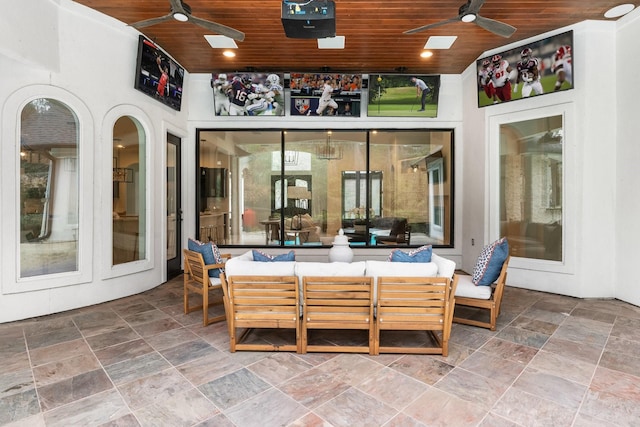 view of patio featuring outdoor lounge area and ceiling fan