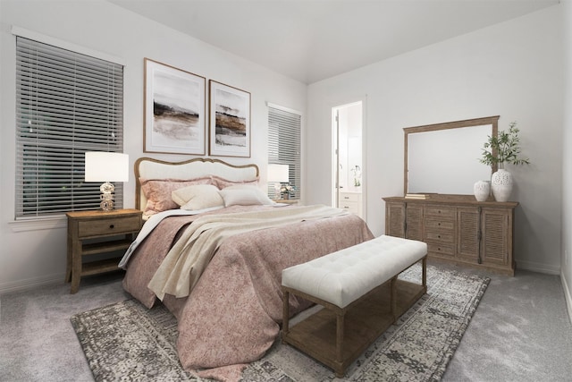 bedroom featuring carpet flooring and ensuite bathroom