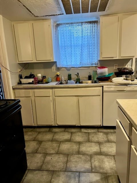 kitchen featuring white cabinets, sink, white dishwasher, and black range with electric stovetop