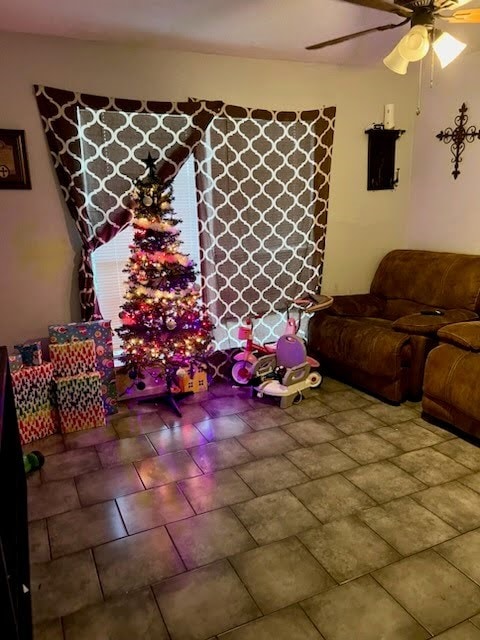 living room featuring ceiling fan