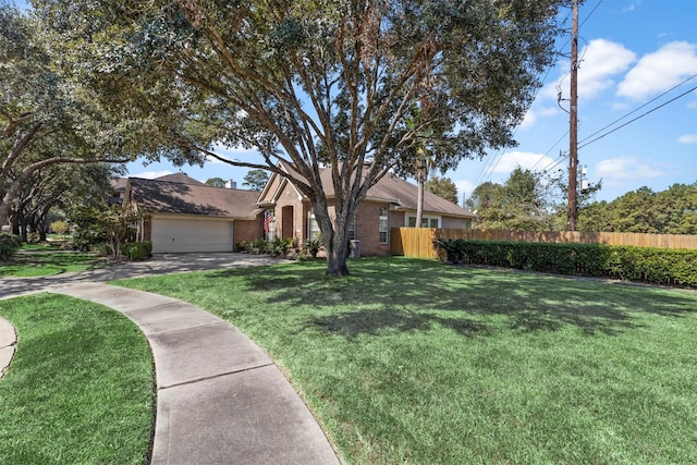 ranch-style home with a garage, a front lawn, fence, and brick siding