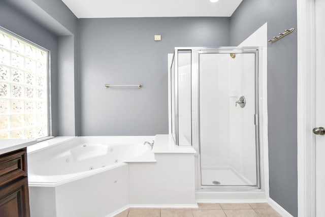 bathroom featuring separate shower and tub and tile patterned floors