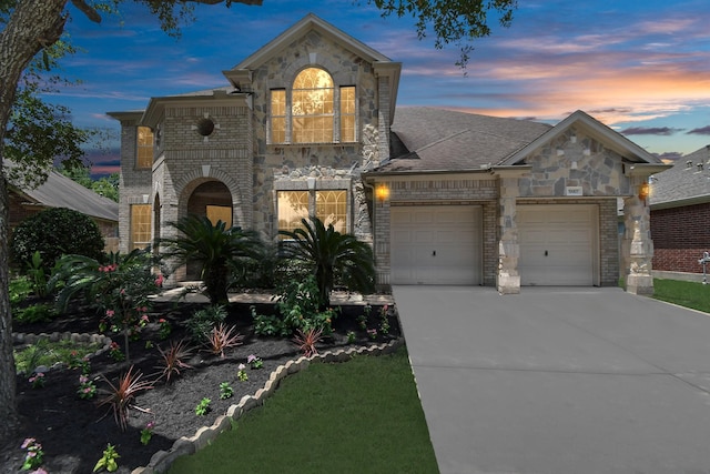 view of front of home with a garage