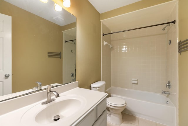 full bathroom featuring toilet, vanity, bathing tub / shower combination, and tile patterned floors