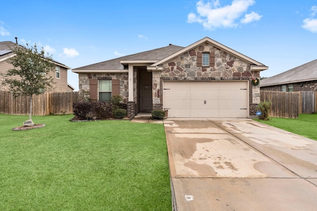 view of front of home featuring a garage and a front lawn