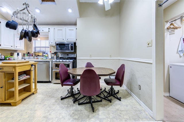 kitchen with white cabinetry and stainless steel appliances