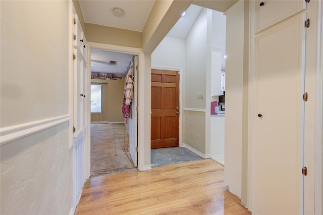 corridor featuring light hardwood / wood-style flooring