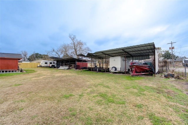 view of yard featuring a carport