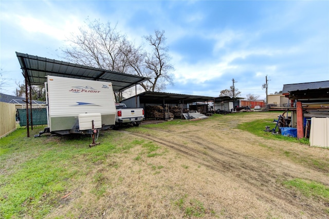 exterior space with a carport