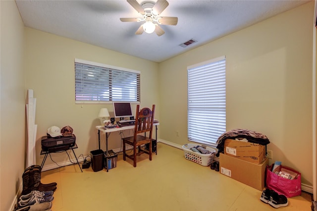 office space featuring ceiling fan