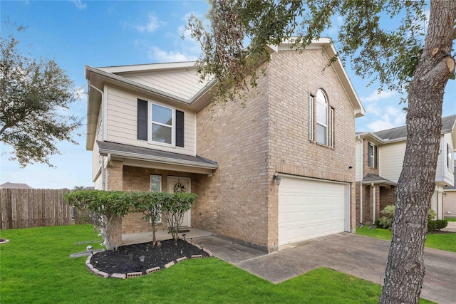 view of front of property featuring a garage and a front lawn