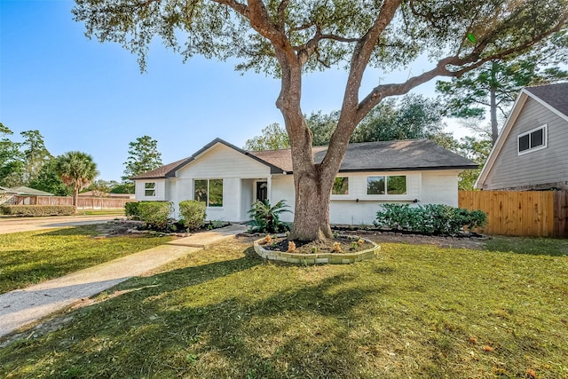 ranch-style house with a front yard