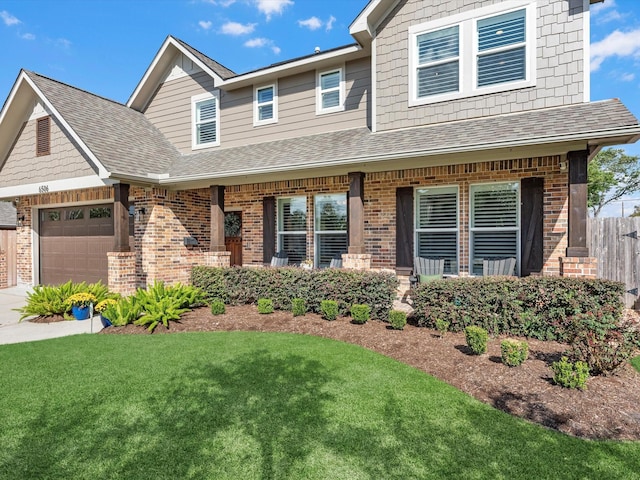 view of front facade with a front lawn and a garage