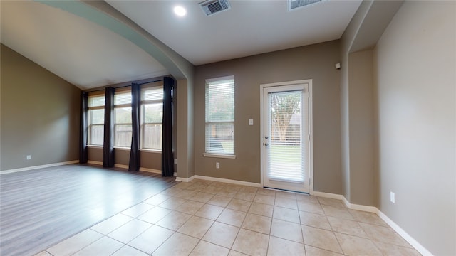 view of tiled spare room