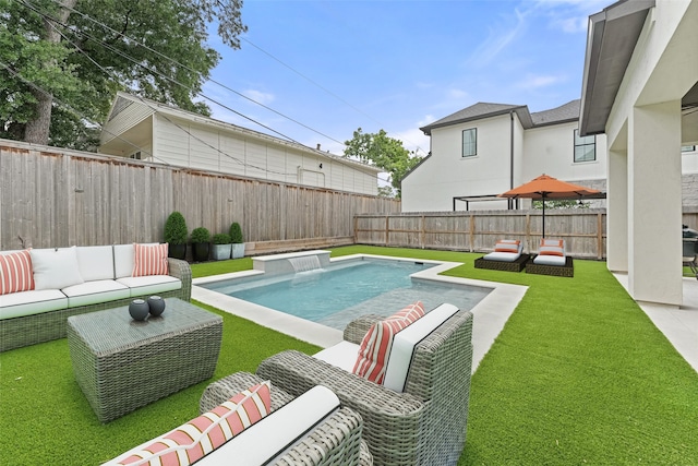 view of pool with a lawn, pool water feature, and an outdoor hangout area