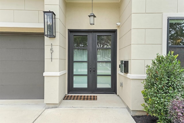 property entrance featuring french doors