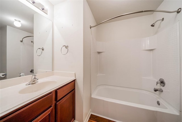 bathroom with shower / bathing tub combination and vanity