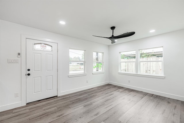 entryway with ceiling fan and light wood-type flooring